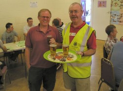 Past President Lion Jim Storey with a happy drinker